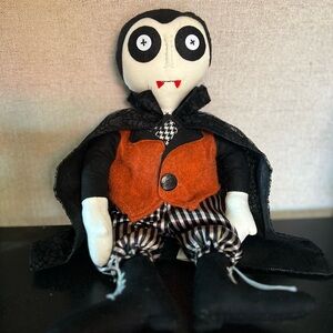 Plush Vampire Decor with Bright Orange Vest